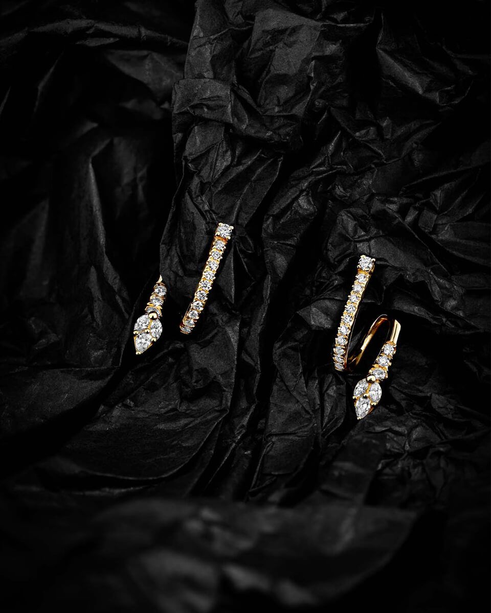 עגילי מלווין מלופפים יהלומים