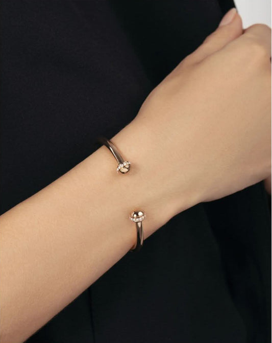POSSESION open bracelet set with diamonds in red gold
